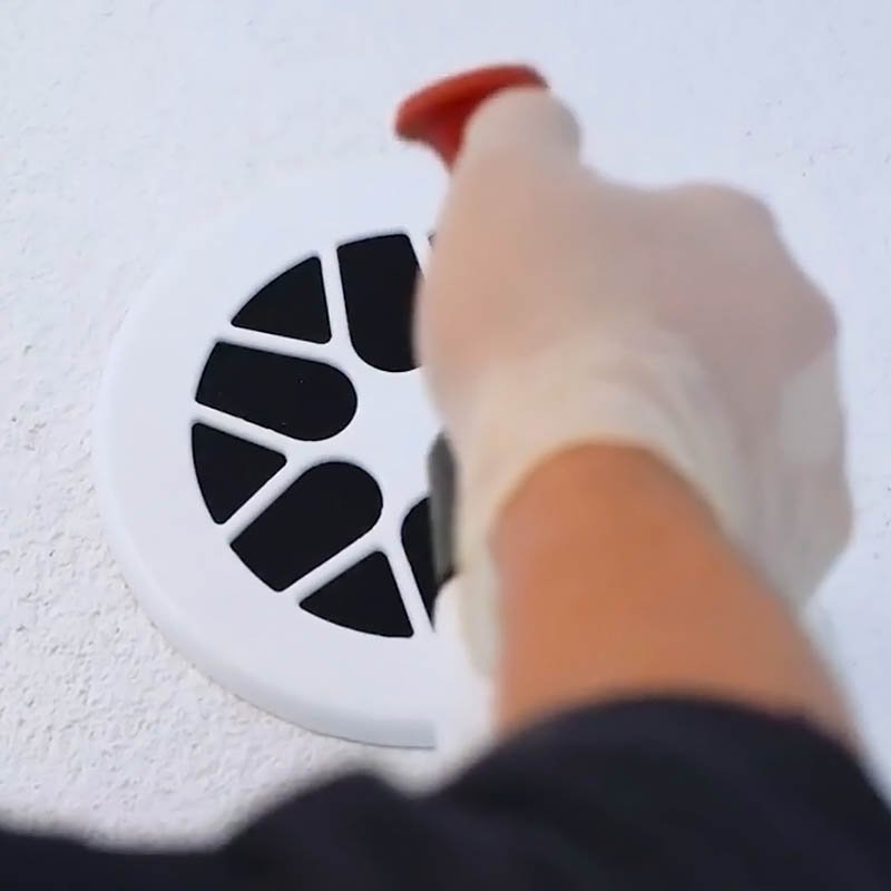 Professional technician inspecting HVAC duct system during residential air duct cleaning service in Topeka, KS