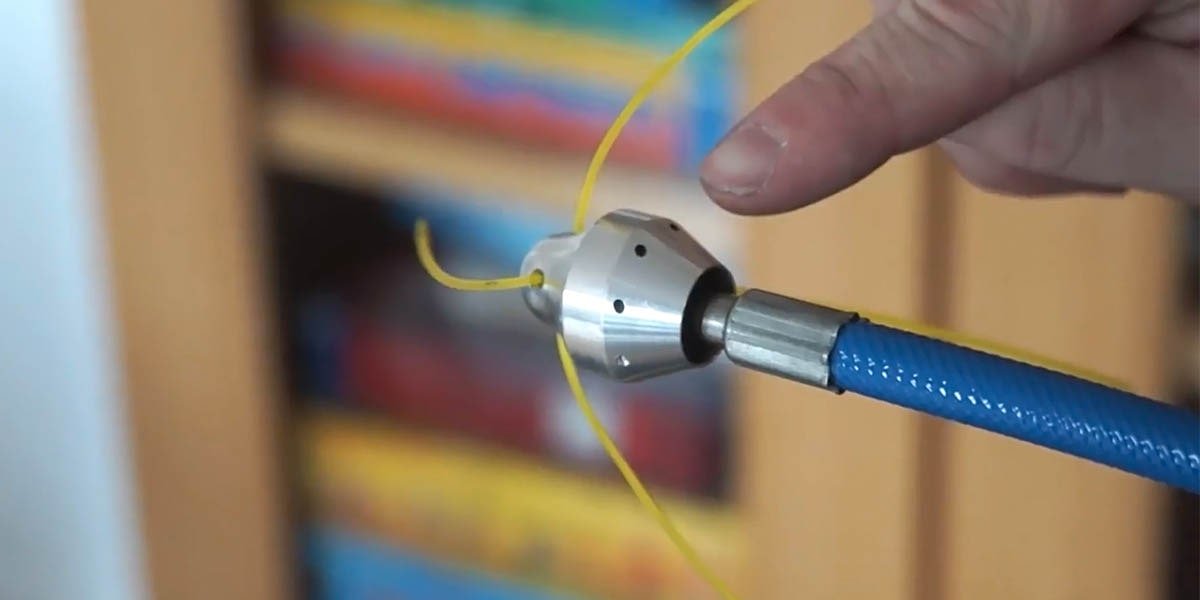 Showing a residential air duct cleaning brush inside Topeka living room